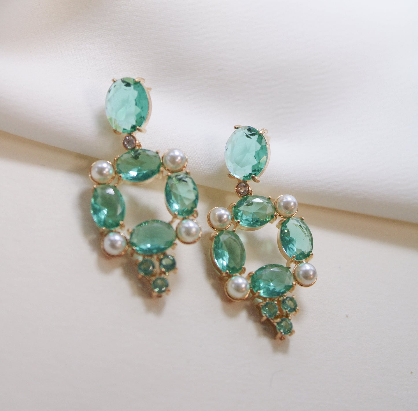 green earing in oval cascade and pearls