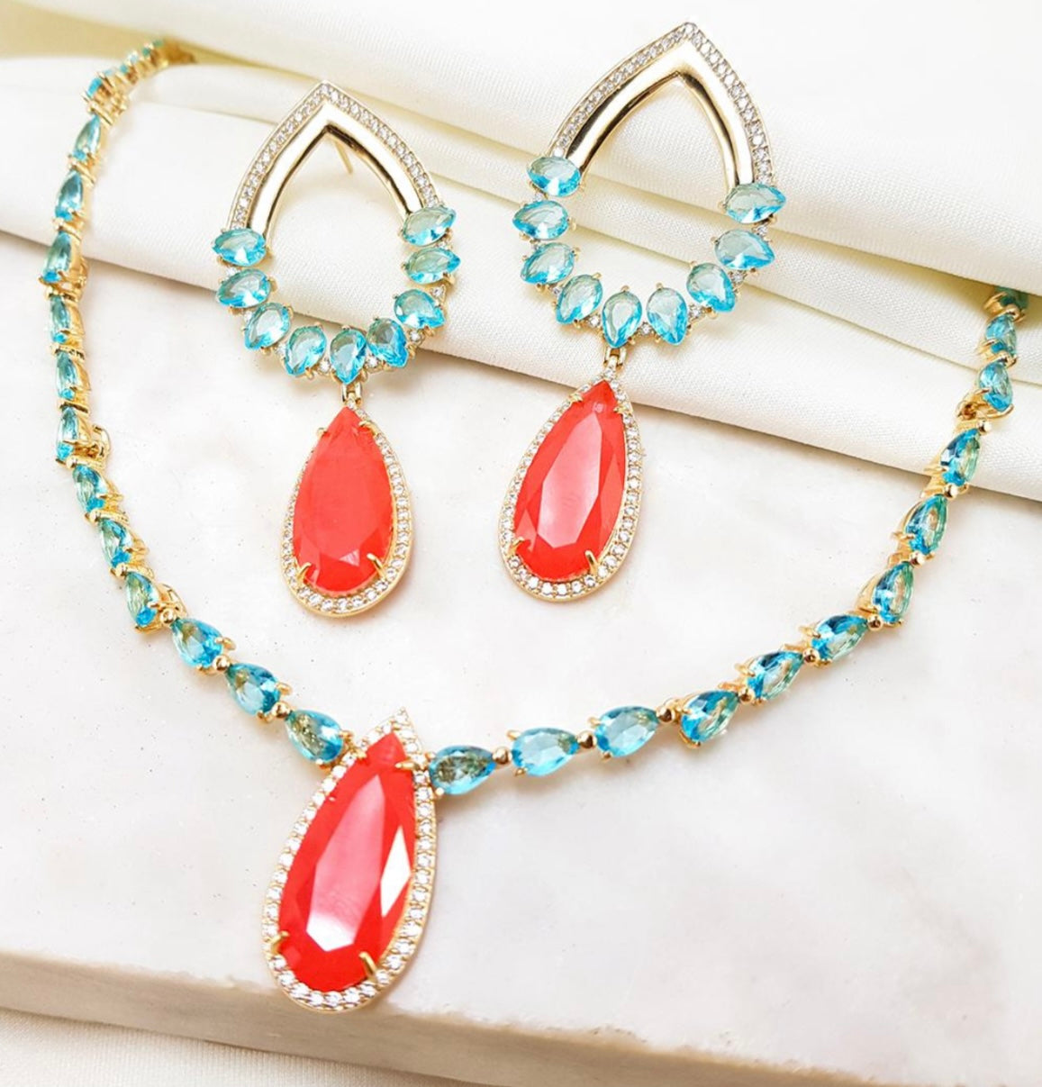 Conjunto - Conjunto rivieira azul 3mm- com pingente laranja e cravejado de zirconias c/ brincos maxi lux