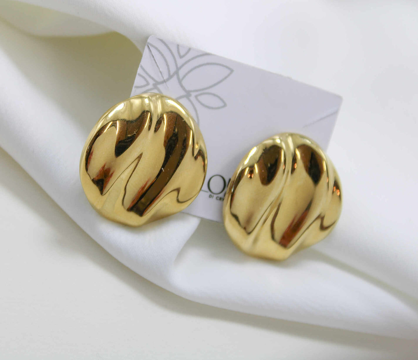 Brinco - botao ondulado