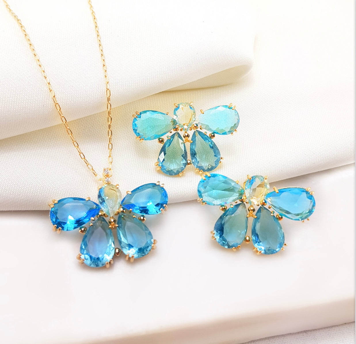 Conjunto - Conjunto colar e brinco Pedraria -Meia Flor azul cravejada