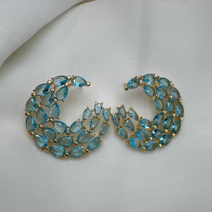 Brinco circular em zirconias azul