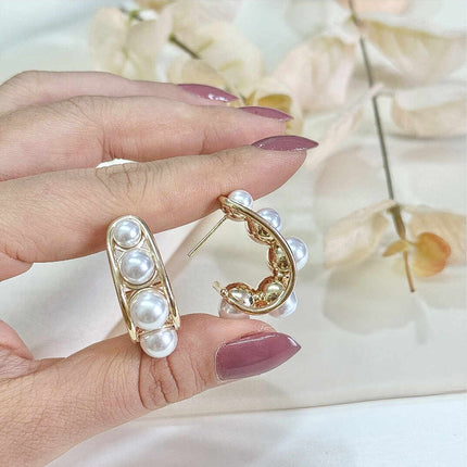 Argola alongada em perola shell 