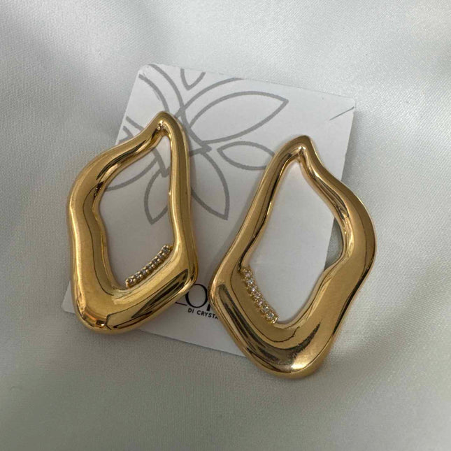 Brinco organico com carreira zirconias cravejada