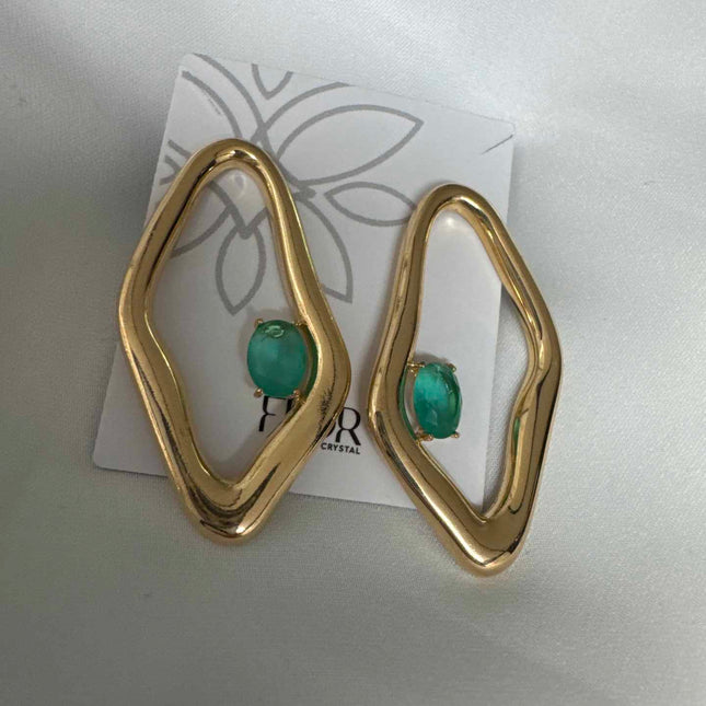 Brinco organico com  zirconias verde