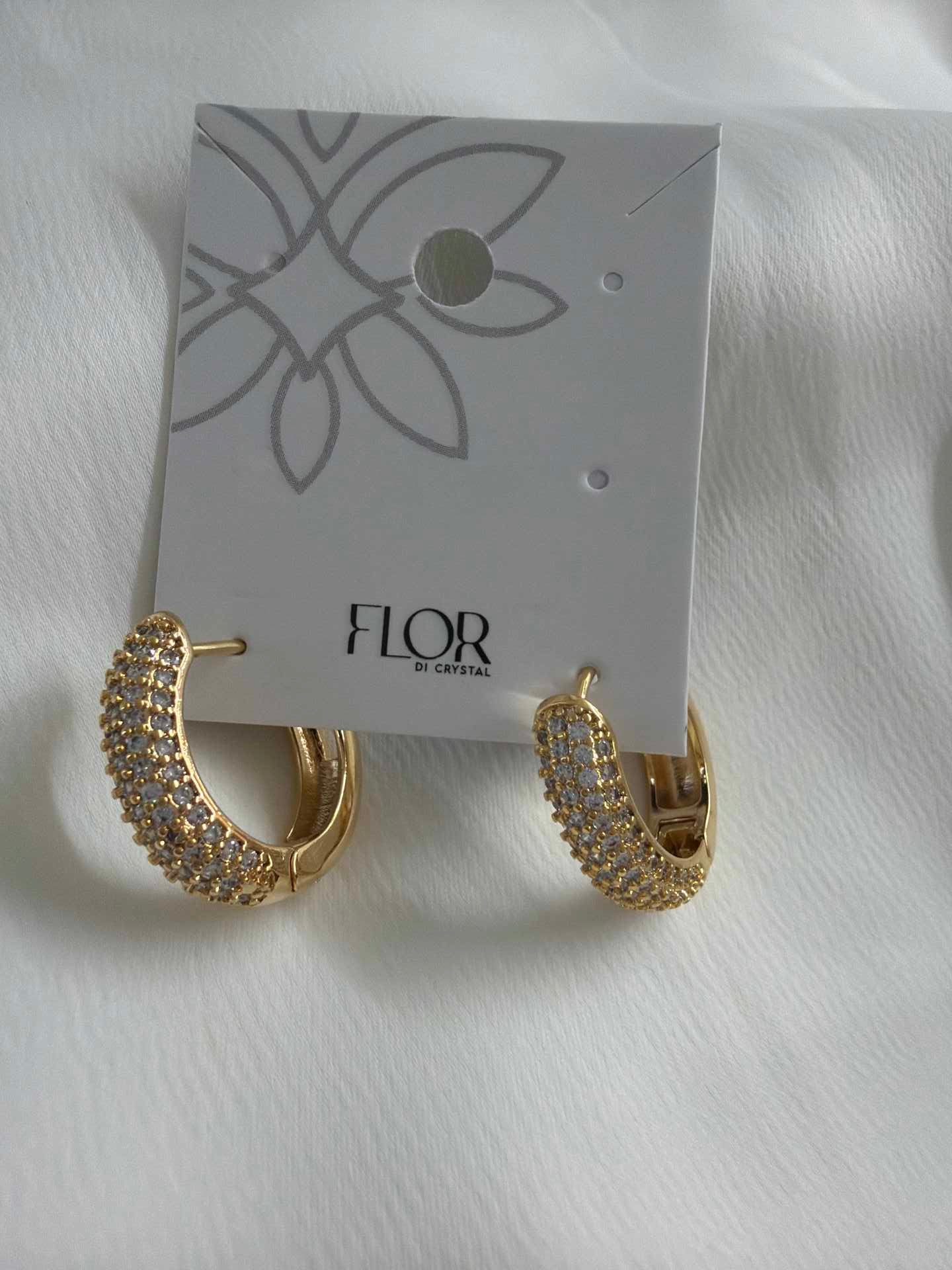 Oval pave Hoop earing with 7 rolls of cz