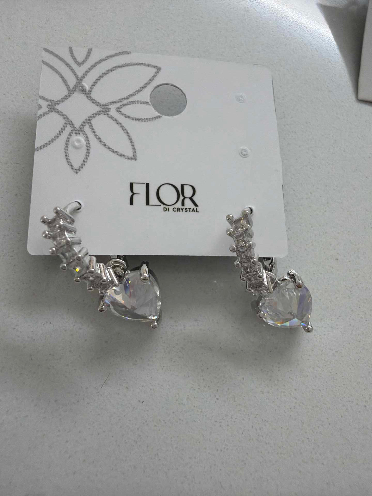 Paved hoop earings with clear heart pendant 