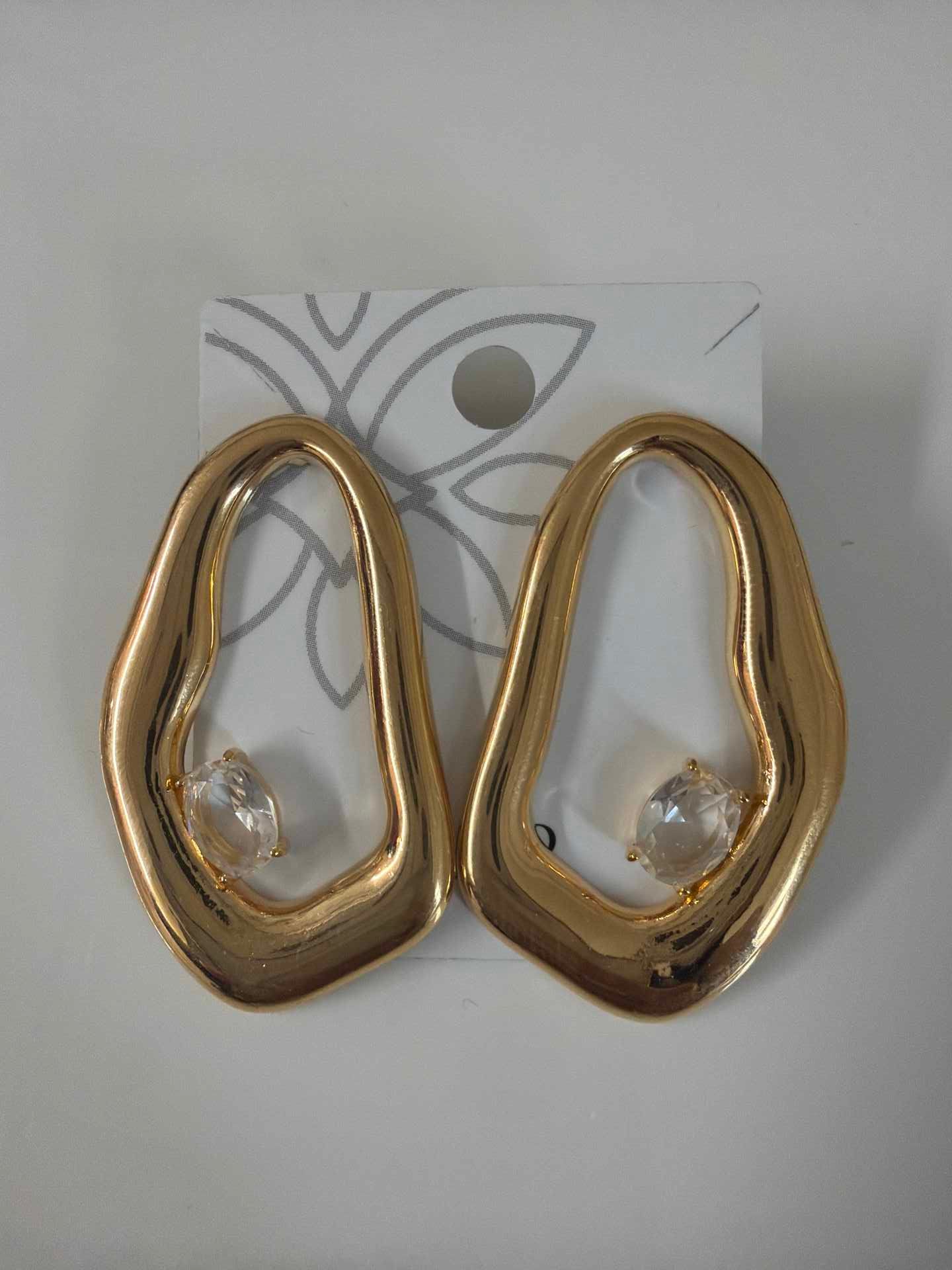 Brinco organico com  zirconias clear