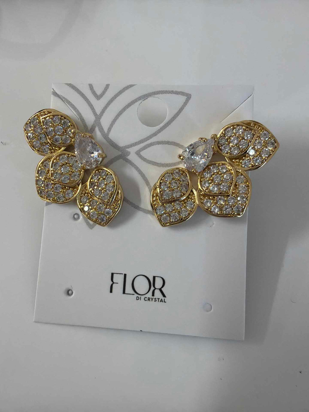 Half Flower earing with  detail in cz pave