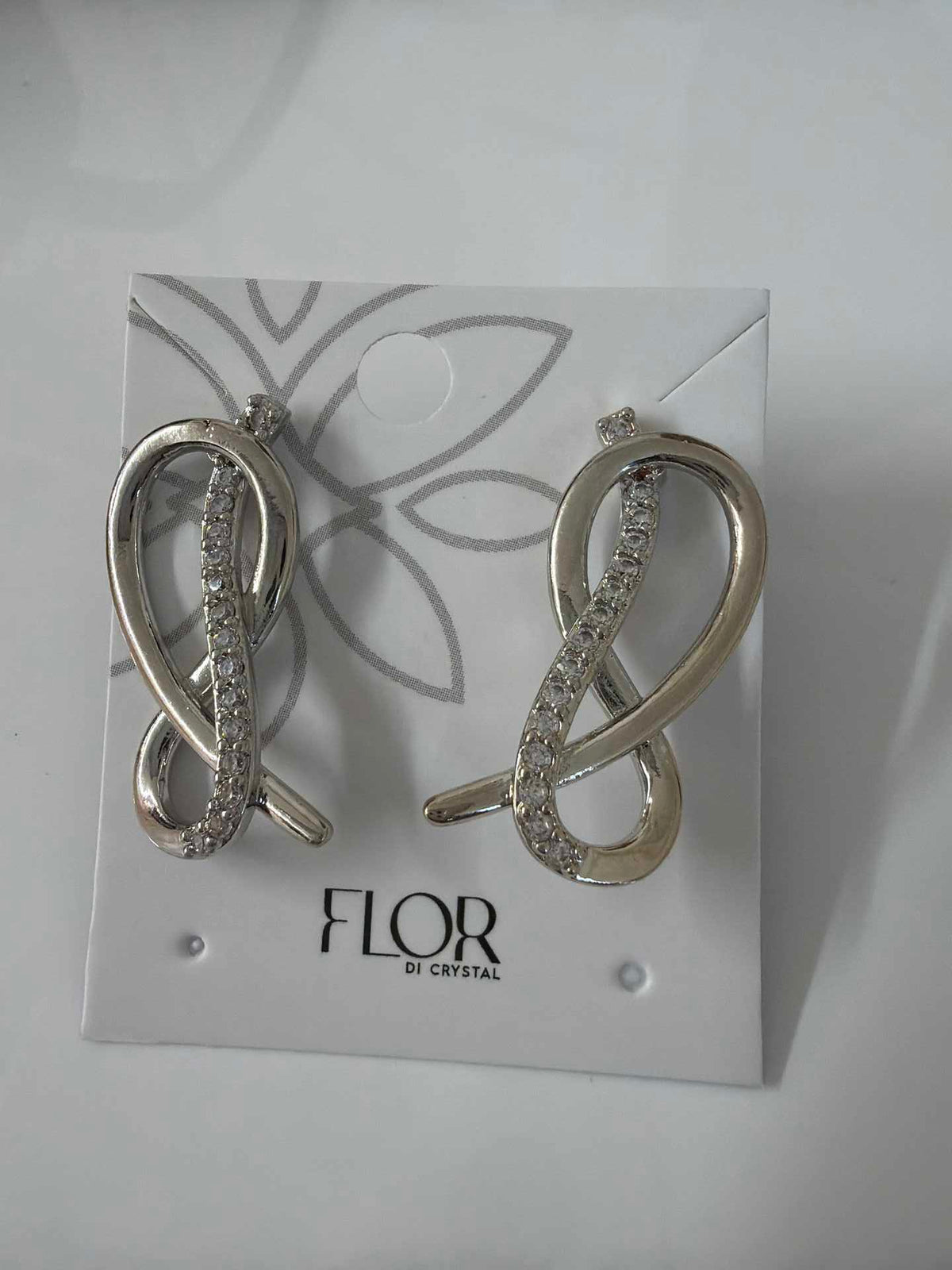 twisted loop earing  cz pave