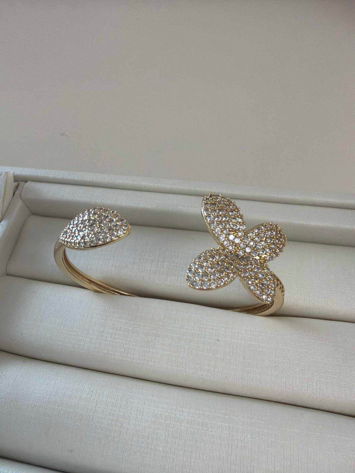 Pave bracelet in flower and leaf detail  cz