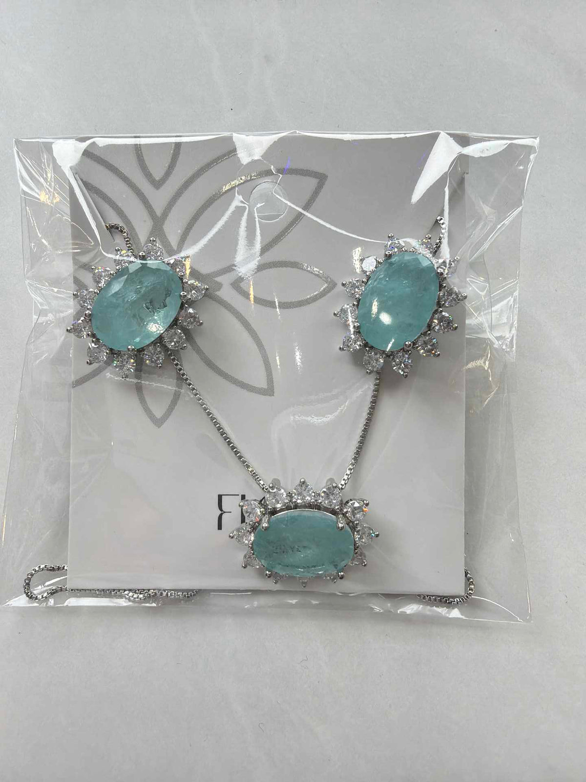 Round blue paraiba  fusion w/ halo cz pave set 