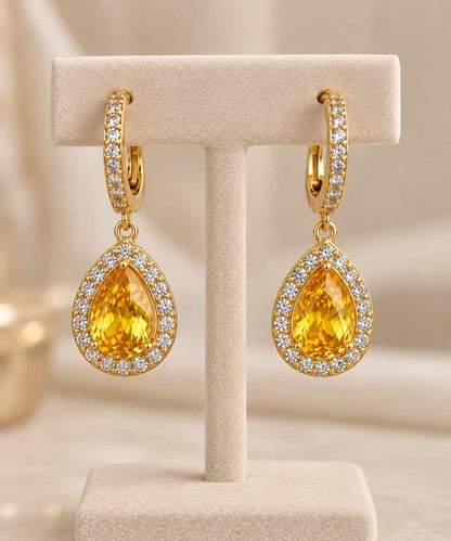 Brinco argola cravejada gota yellow 