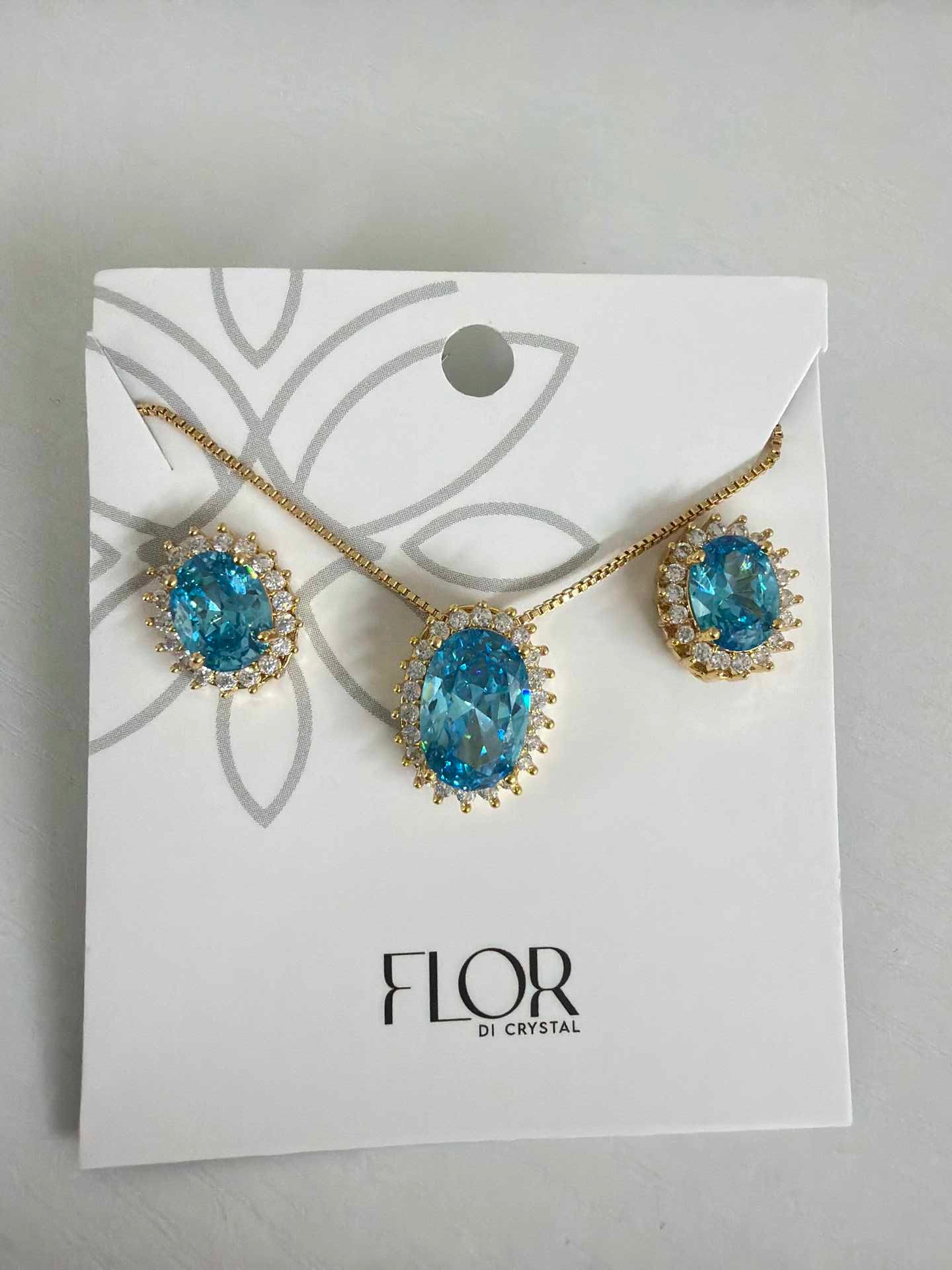 Oval turquoise cz w/ halo cz pave set 