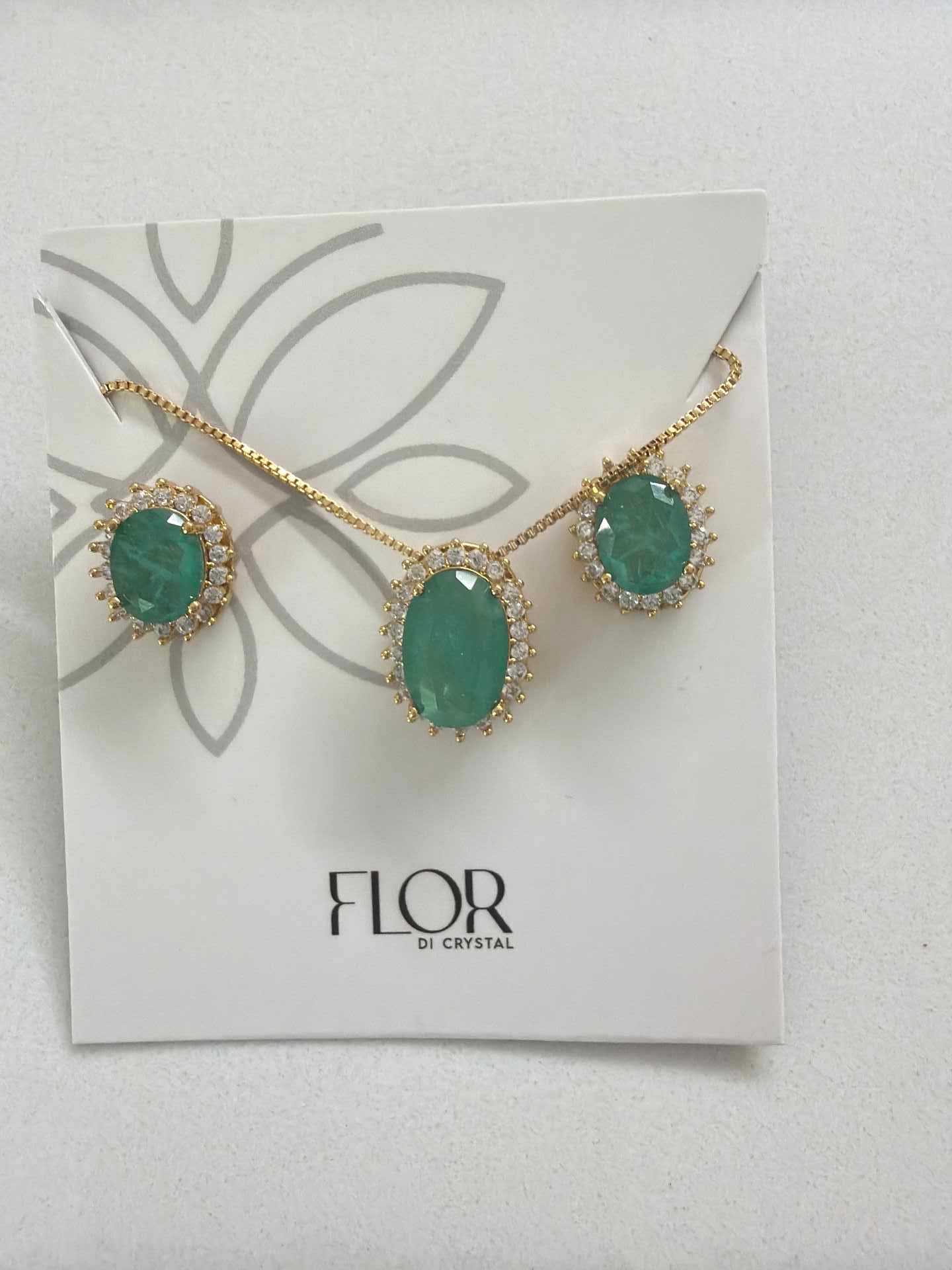 Oval esmeralda fusion w/ halo cz pave set 