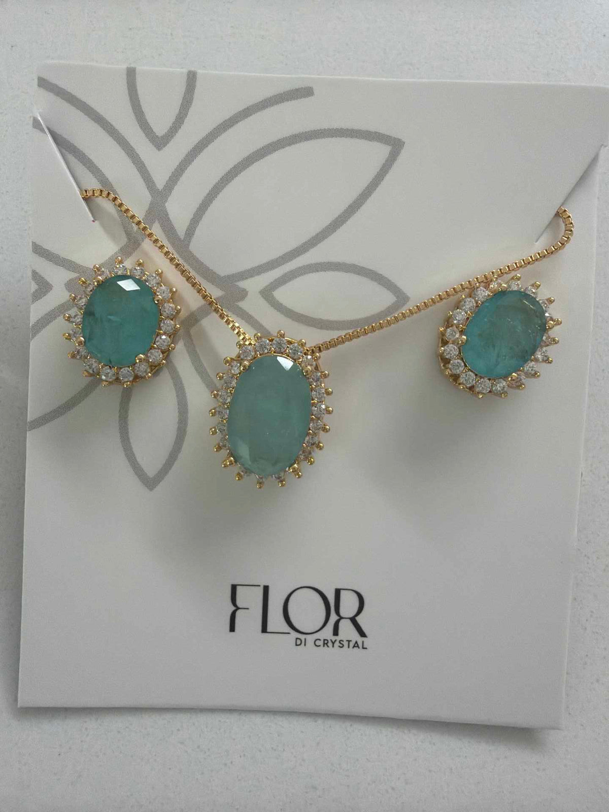 Oval paraiba fusion w/ halo cz pave set 