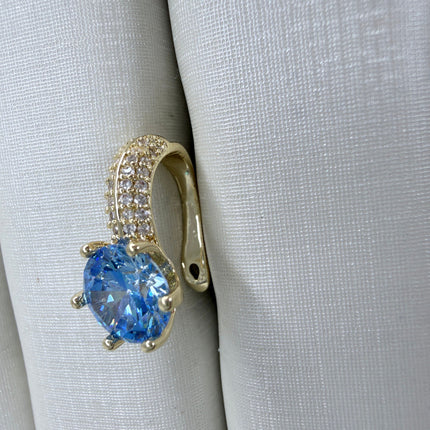 Piercing fake solitário azul com aro cravejado