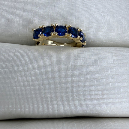 Piercing fake cravejado em zircônia azul