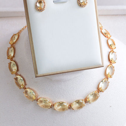Conjunto colar brincos pedra amarela oval