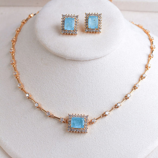 Conjunto colar brincos pedra azul retangular