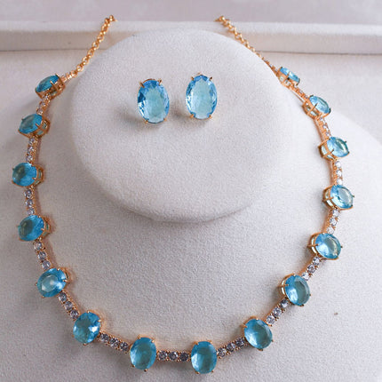 Conjunto colar brincos pedra azul oval
