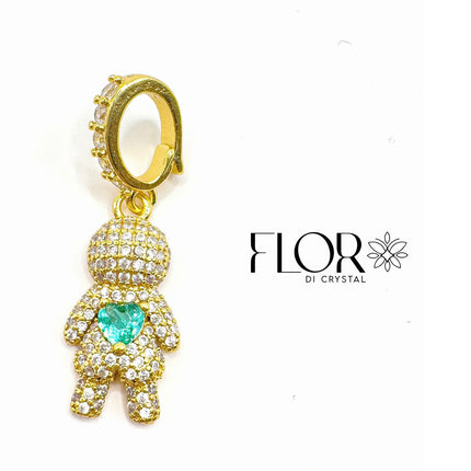 boneco dourado com zircônias e pedra verde
