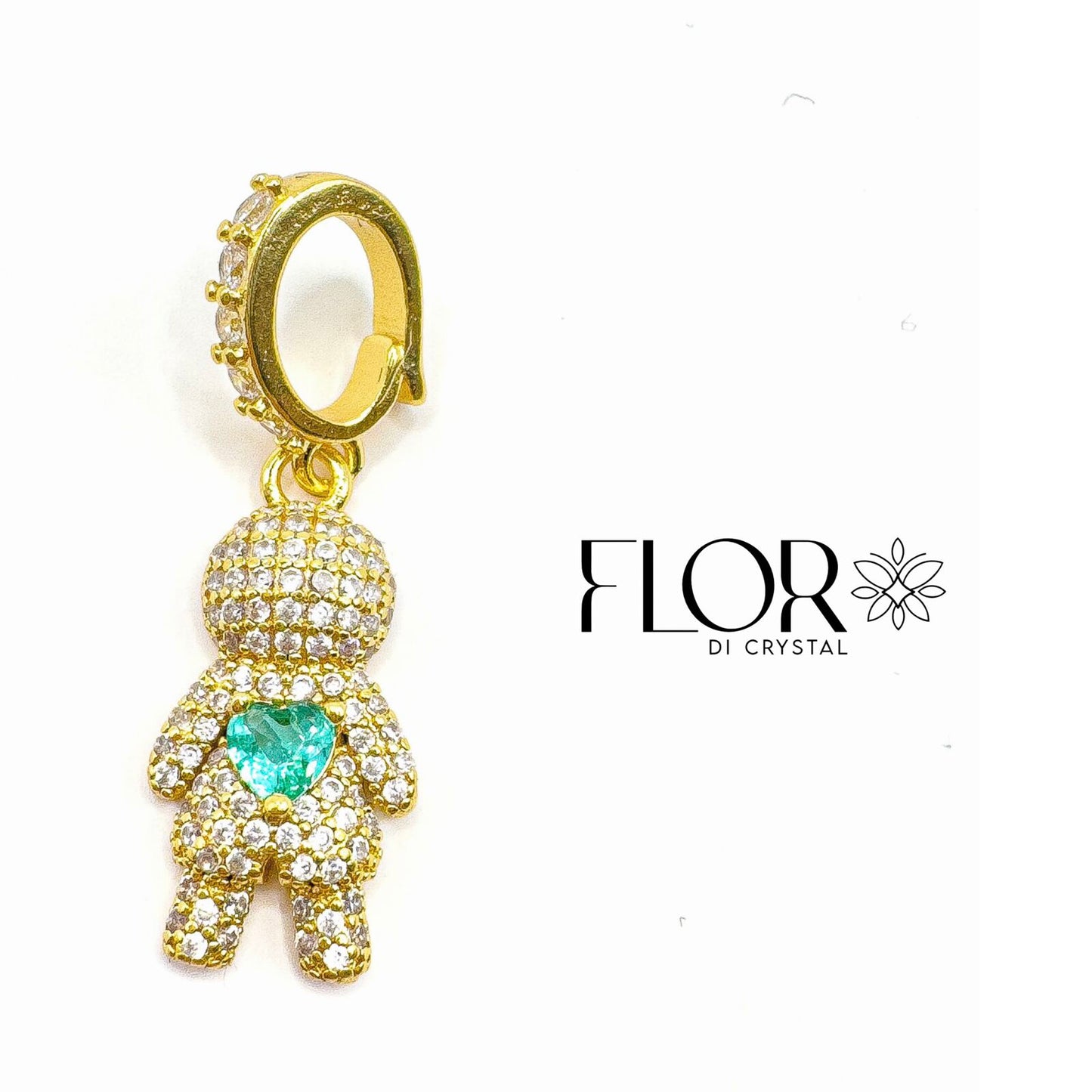 Pingente - boneco dourado com zirconias e pedra verde
