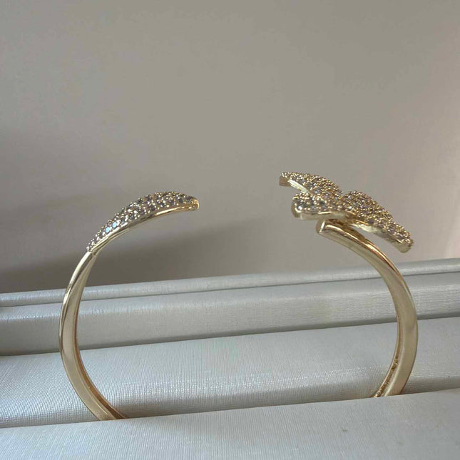 Pave bracelet in flower and leaf detail  cz